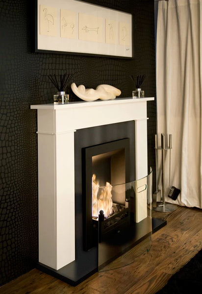 A Bioethanol metal Fireplace box Insert to sit inside a fireplace opening and convert an old open, gas or electric fire inset into a working live fireplace with real flames and real heat but no chimney or flue is needed as it burns bio ethanol liquid / fuel